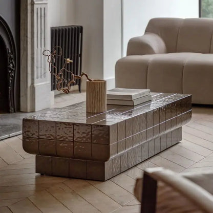 The Gallery Direct Novara Rectangular Coffee Table is an Italian Retro inspired piece of furniture, created from glass reinforced concrete with a charcoal brown colour glaze