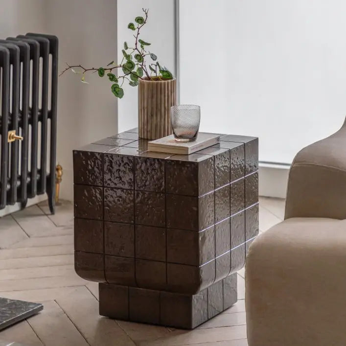 The Gallery Direct Novara Side Table is an Italian Retro Inspired piece in a charcoal brown glaze with faux tile pattern detail, made from GRC
