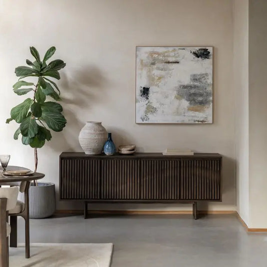 Gallery Direct Onda 4 Door Sideboard with a contemporary Italian inspired design of dark wooden frame and a slatted wave design to the front cupboard doors 