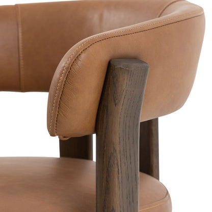Gallery Direct Onda Dining Chair features Brown Leather padded seat and backrest with a dark wooden frame 