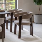 Gallery Direct Onda Dining Chair in a Natural coloured linen upholstery with a contemporary charcoal brown wooden frame 