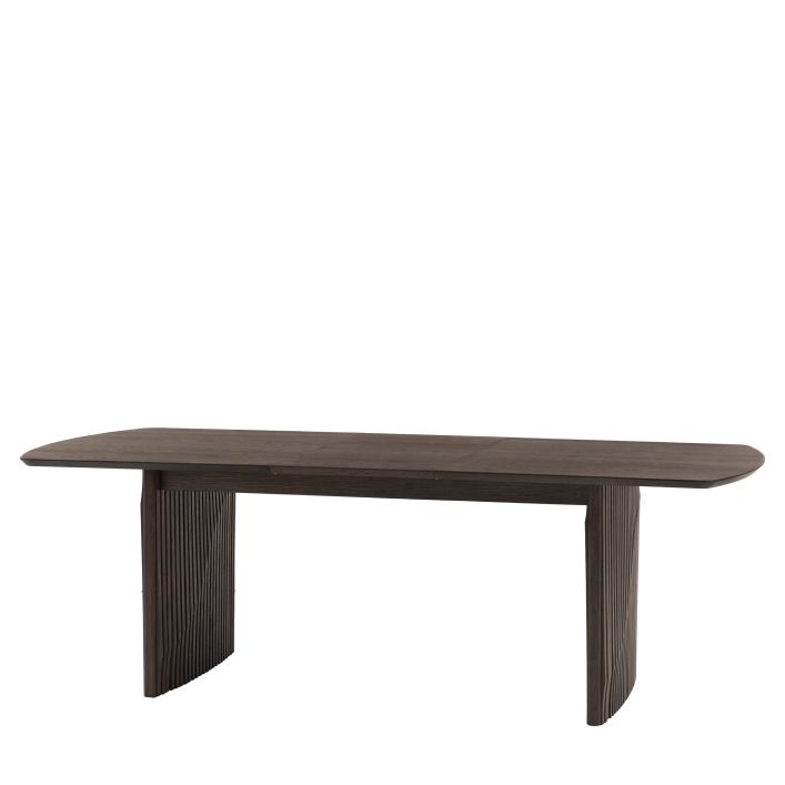 Gallery Direct Onda Extending Dining Table can seat 6 people and features an extending mechanism, and slatted wave detailing to the legs