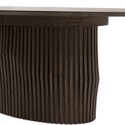 Gallery Direct Onda Oval Extending Dining Table constructed from solid oak wood and veneers with a distinctive slatted wave design base and sleek table top  