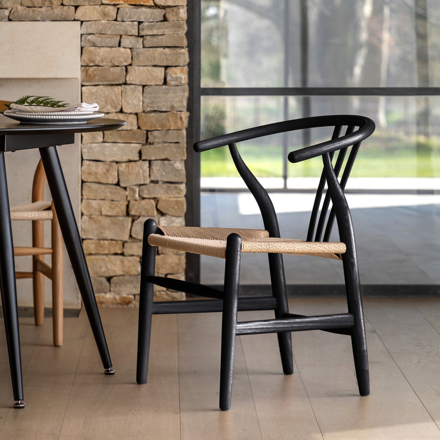 Gallery Direct Pair of Whitney Chairs in Black coloured Elm wood with a wishbone backrest and a rope woven seat