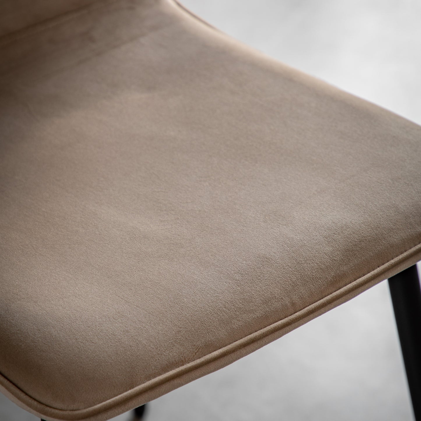 Gallery Direct Pair of Widdicombe Dining Chairs upholstered in a soft Taupe coloured velvet style fabric with refined line stitching