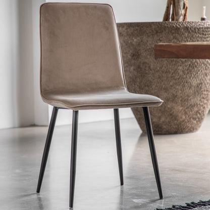 Gallery Direct Pair of Widdicombe Dining Chairs are fully upholstered in a soft neutral Taupe coloured fabric with contrasting black metal legs 