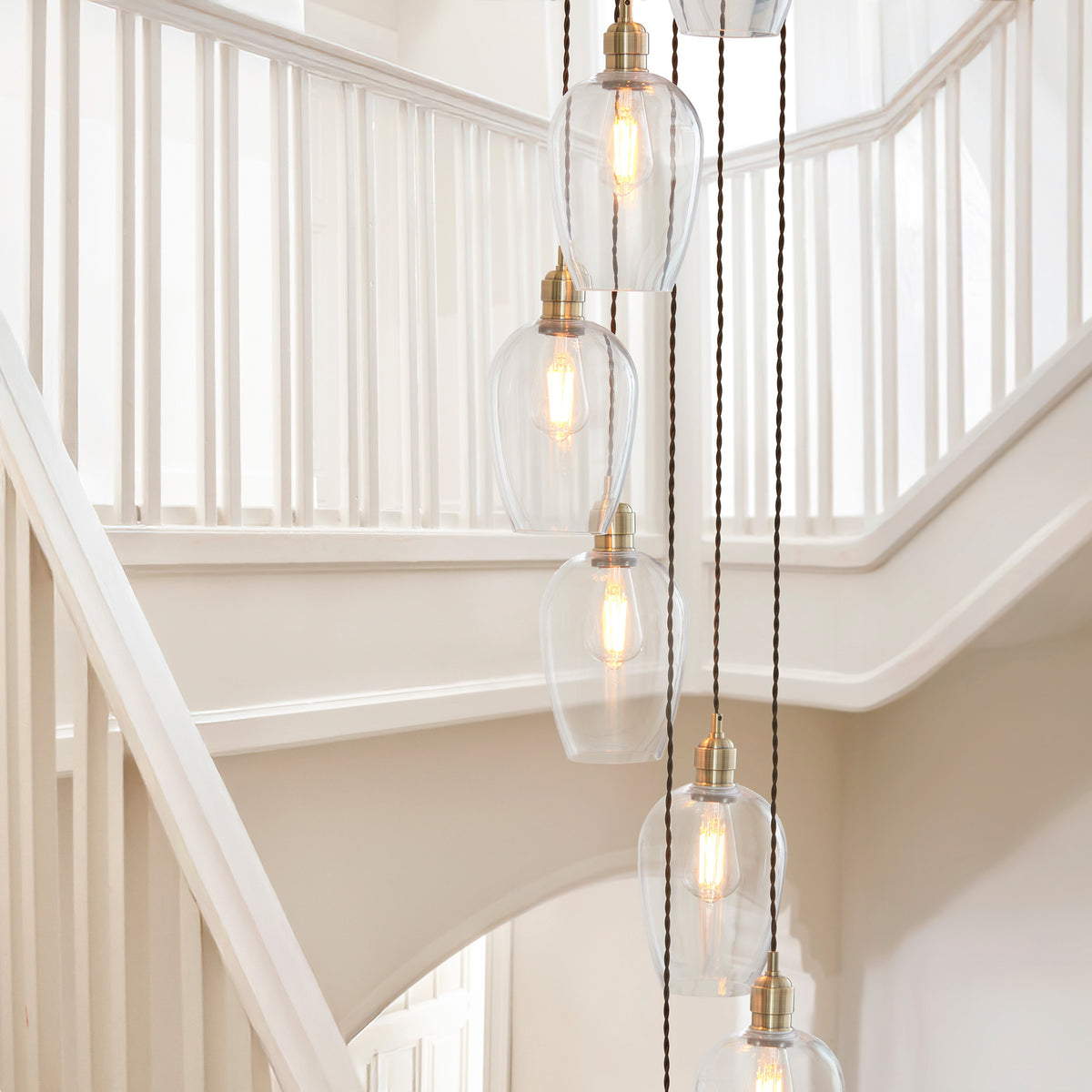 Gallery Direct Polaris 13 Pendant Light Antique Brass, styled in a room setting