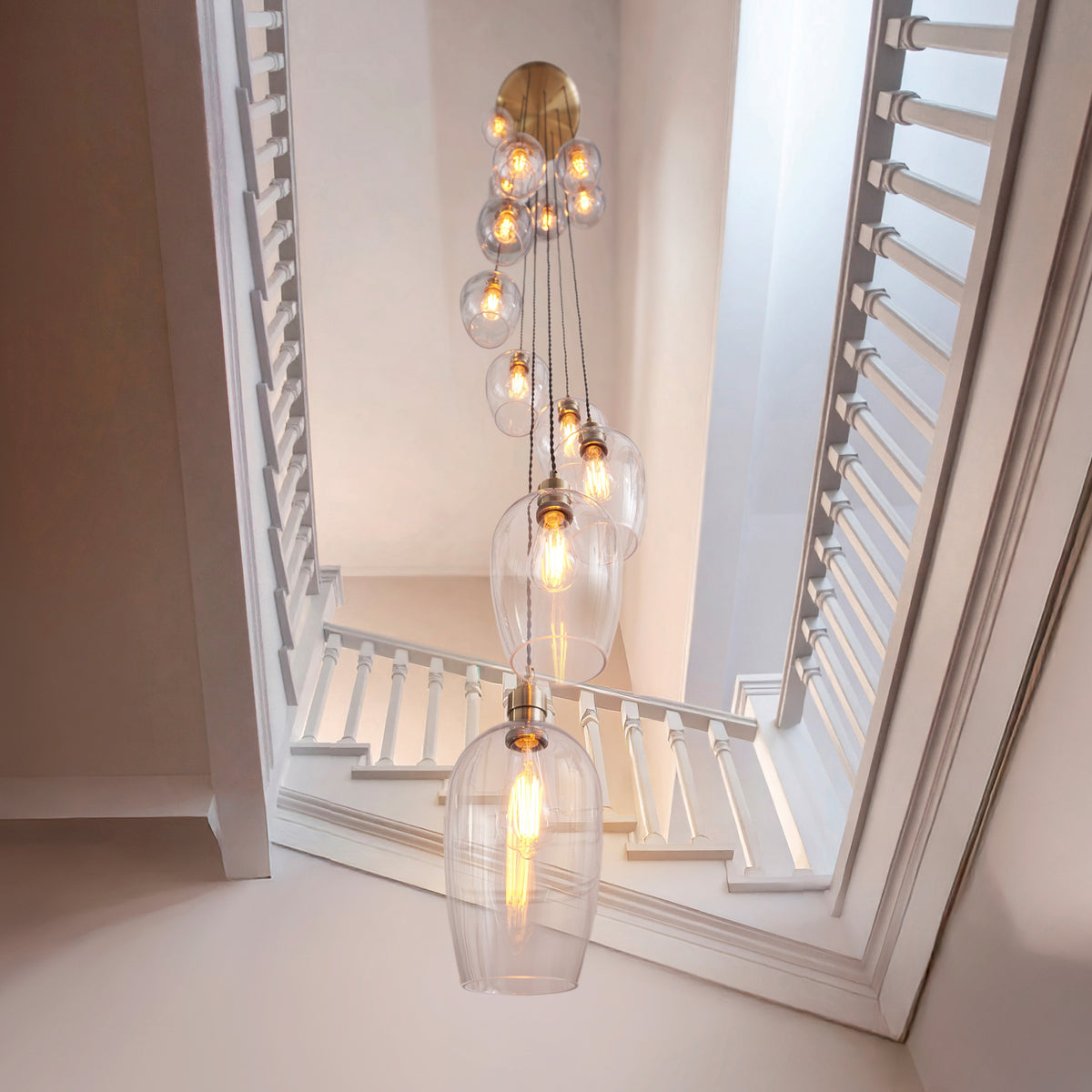 Gallery Direct Polaris 13 Pendant Light Antique Brass, styled in a room setting