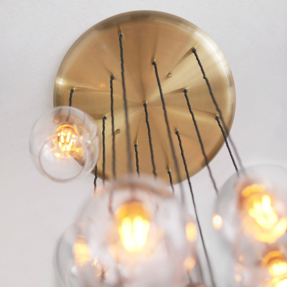 Gallery Direct Polaris 13 Pendant Light Antique Brass, close-up of the finish and design