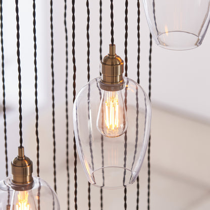 Gallery Direct Polaris 13 Pendant Light Antique Brass, close-up of the finish and design