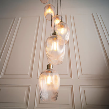 Gallery Direct Polaris 13 Ribbed Pendant Light Antique Brass, styled in a room setting