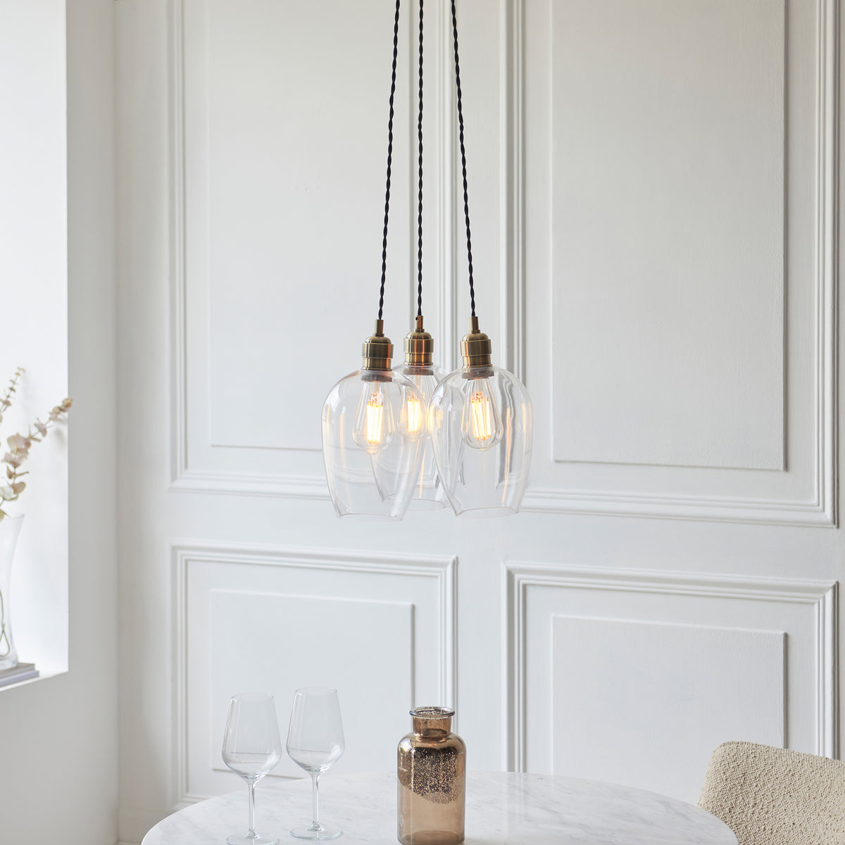 Gallery Direct Polaris 3 Cluster Pendant Light Antique Brass, styled in a room setting