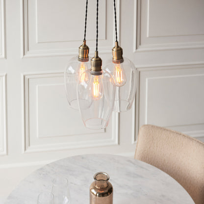 Gallery Direct Polaris 3 Cluster Pendant Light Antique Brass, styled in a room setting