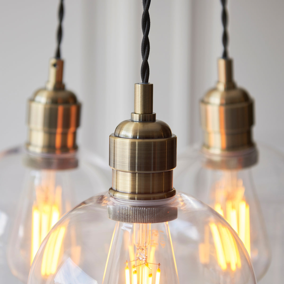 Gallery Direct Polaris 3 Cluster Pendant Light Antique Brass, close-up of the finish and design