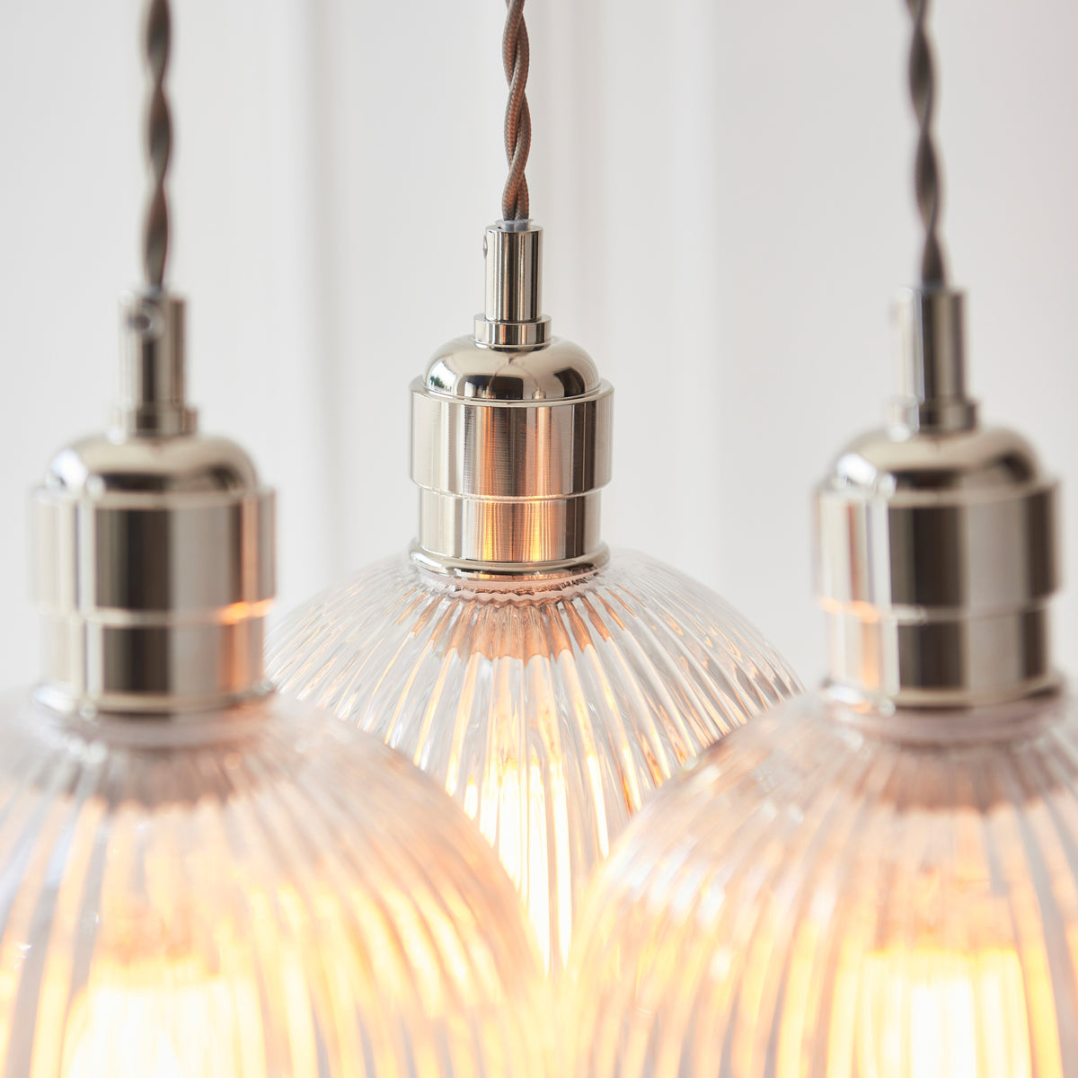Gallery Direct Polaris 3 Ribbed Cluster Pend Light Bright Nickel, close-up of the finish and design
