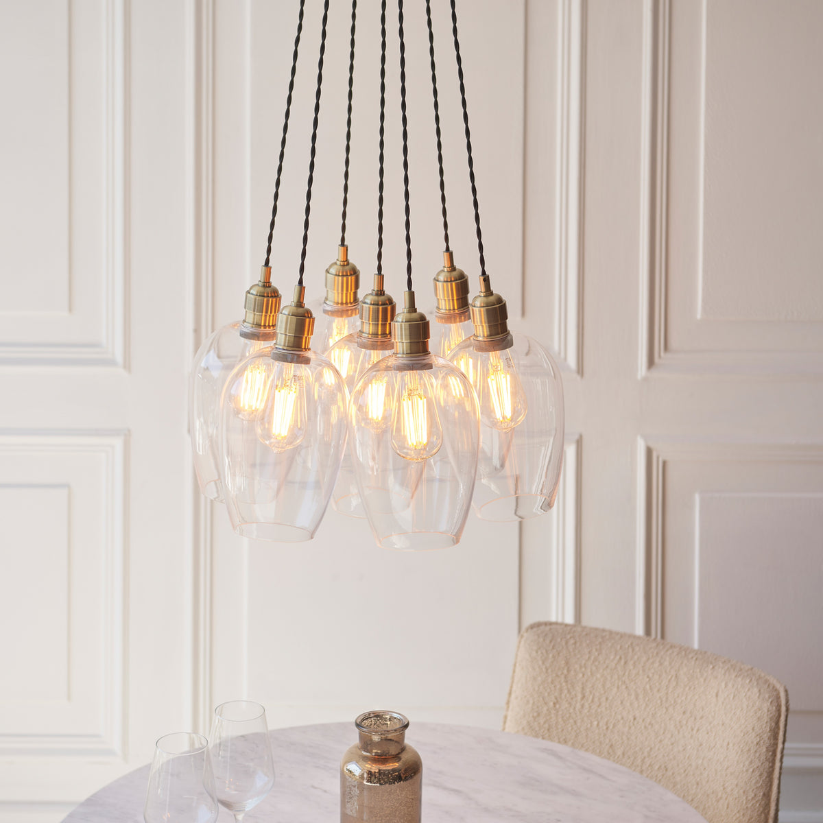Gallery Direct Polaris 7 Cluster Pendant Light Antique Brass, styled in a room setting