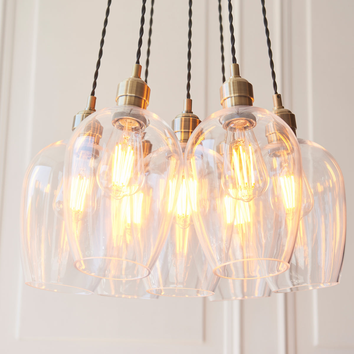 Gallery Direct Polaris 7 Cluster Pendant Light Antique Brass, close-up of the finish and design