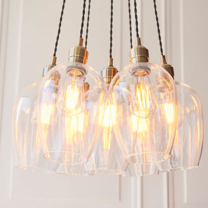 Gallery Direct Polaris 7 Cluster Pendant Light Antique Brass, close-up of the finish and design