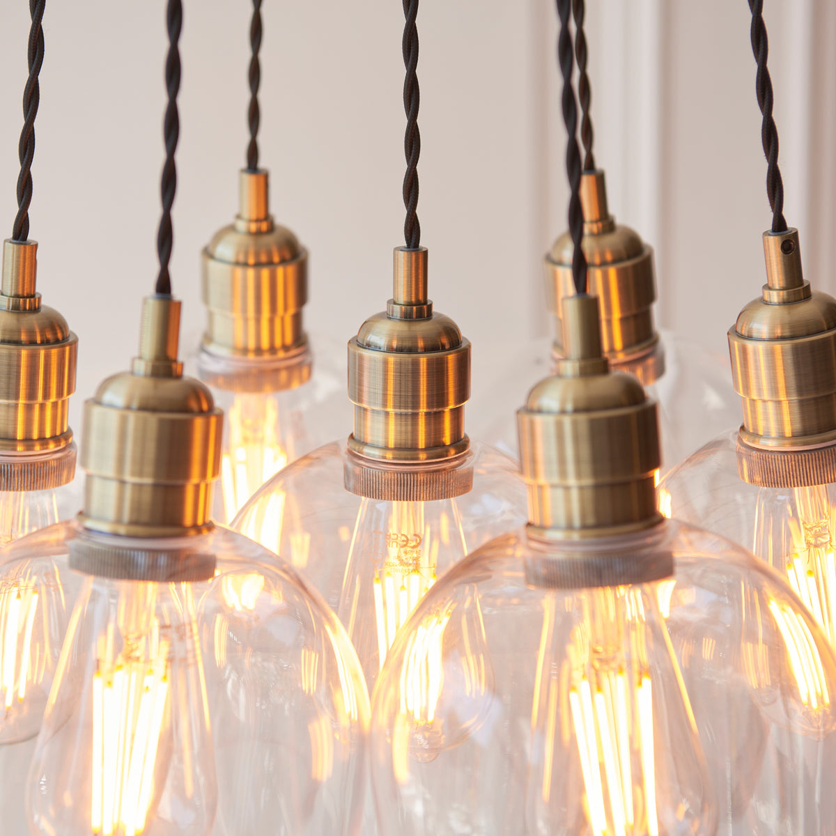Gallery Direct Polaris 7 Cluster Pendant Light Antique Brass, close-up of the finish and design