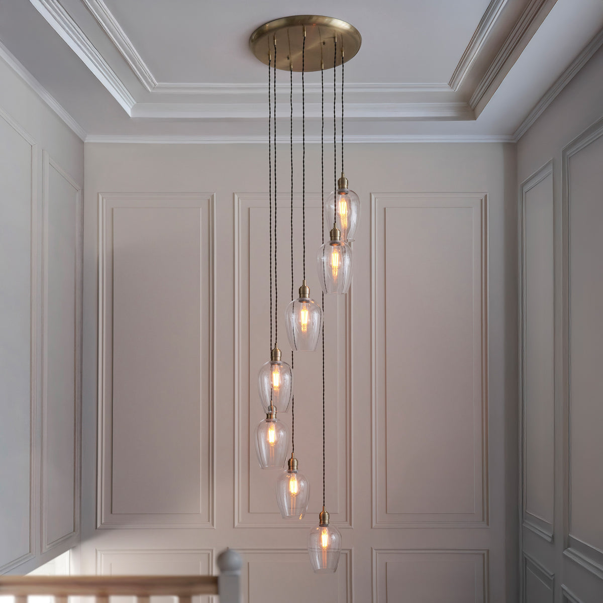 Gallery Direct Polaris 7 Pendant Light Antique Brass, styled in a room setting