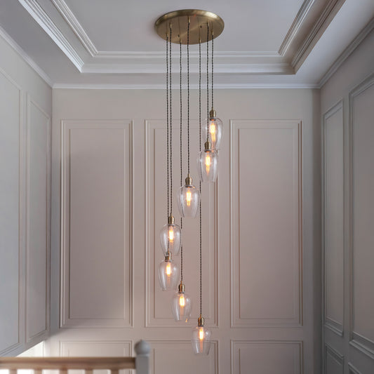 Gallery Direct Polaris 7 Pendant Light Antique Brass, styled in a room setting