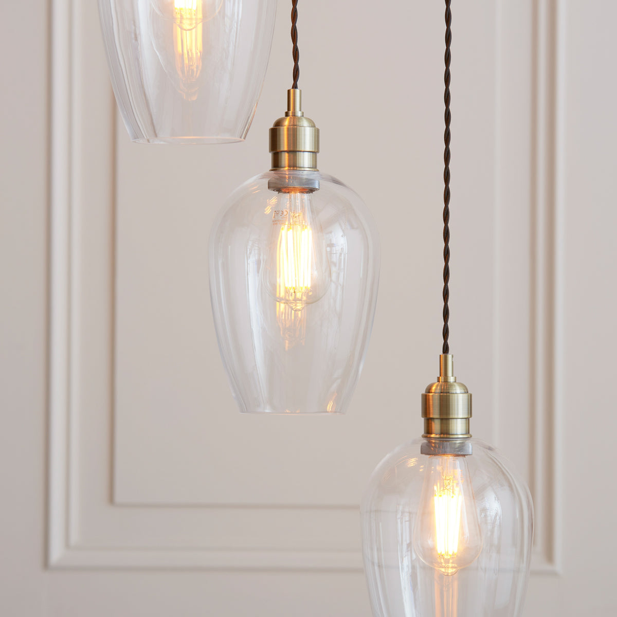 Gallery Direct Polaris 7 Pendant Light Antique Brass, styled in a room setting