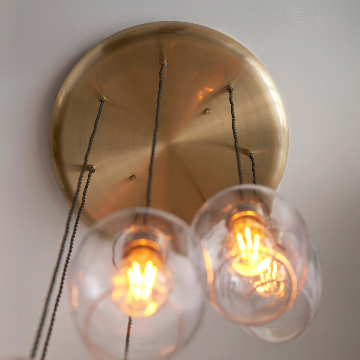 Gallery Direct Polaris 7 Pendant Light Antique Brass, close-up of the finish and design