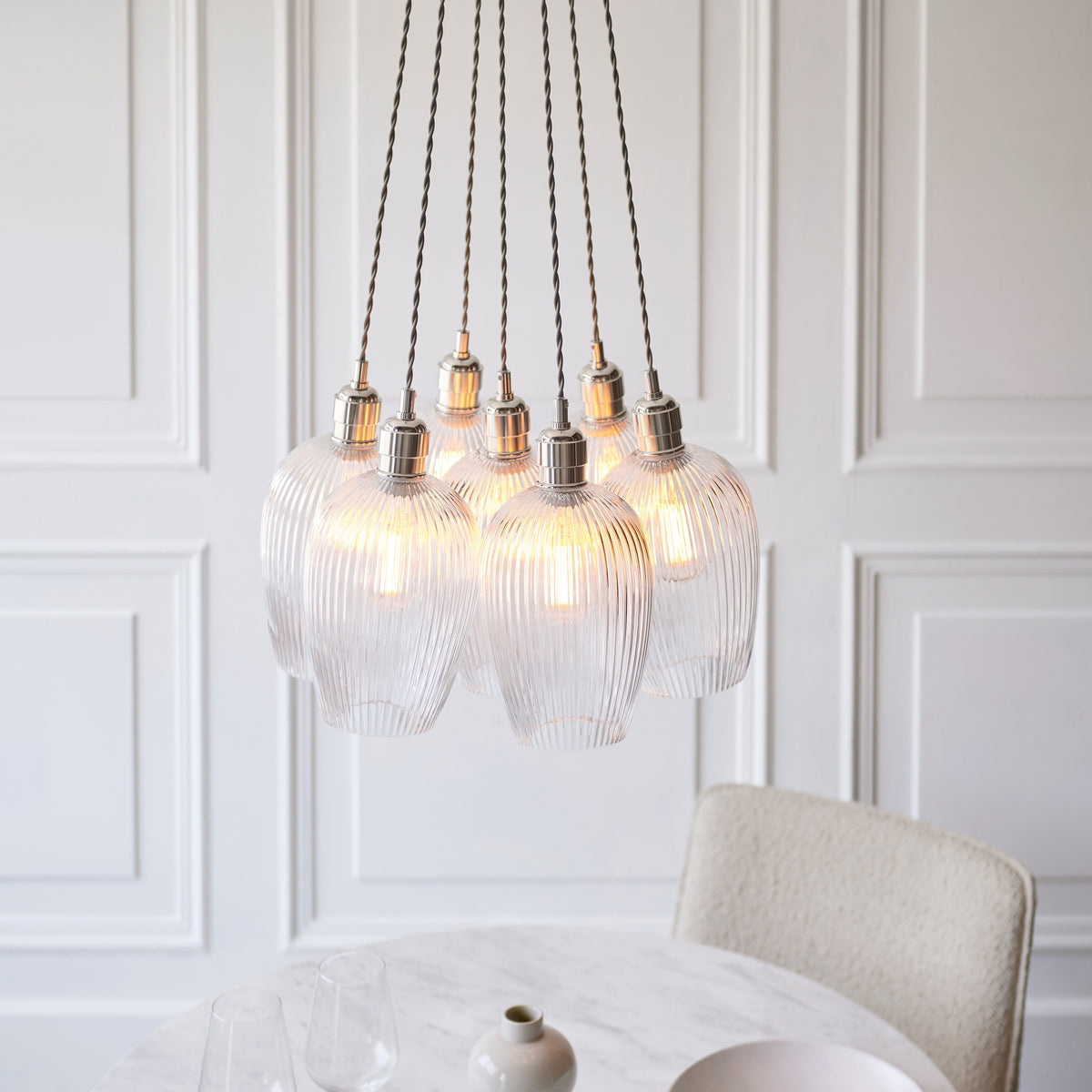 Gallery Direct Polaris 7 Ribbed Cluster Pend Light Bright Nickel, styled in a room setting