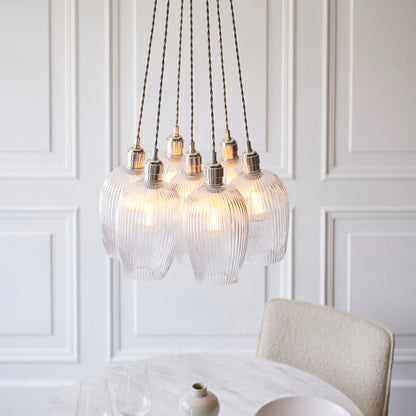 Gallery Direct Polaris 7 Ribbed Cluster Pend Light Bright Nickel, styled in a room setting