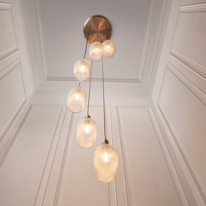 Gallery Direct Polaris 7 Ribbed Pendant Light Antique Brass, styled in a room setting