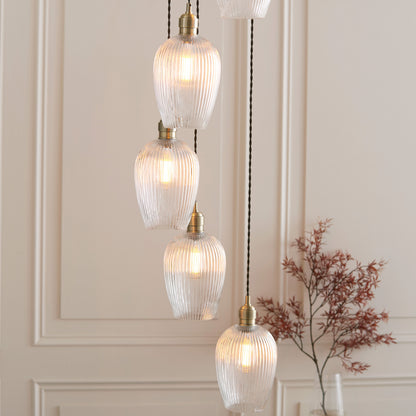 Gallery Direct Polaris 7 Ribbed Pendant Light Antique Brass, styled in a room setting