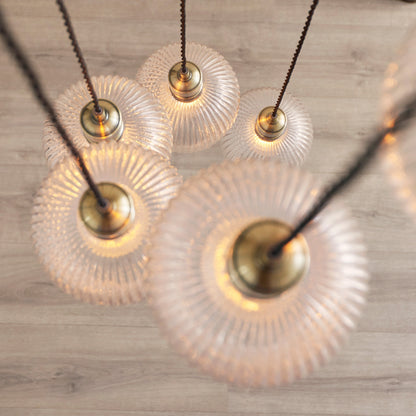 Gallery Direct Polaris 7 Ribbed Pendant Light Antique Brass, close-up of the finish and design