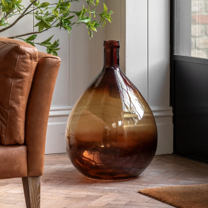 Gallery Direct Rueda Giant Glass Bottle Vase Amber, styled in a supplier lifestyle setting