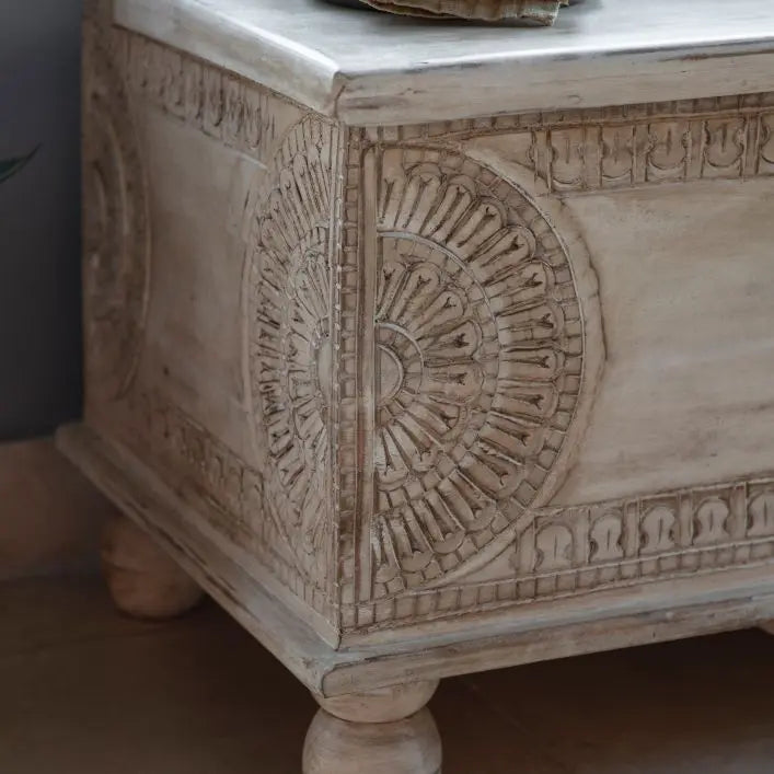 Gallery Direct Satara Storage Table Bench has a shabby chic aesthetic with its intricate carved detailing and subtle washed finish