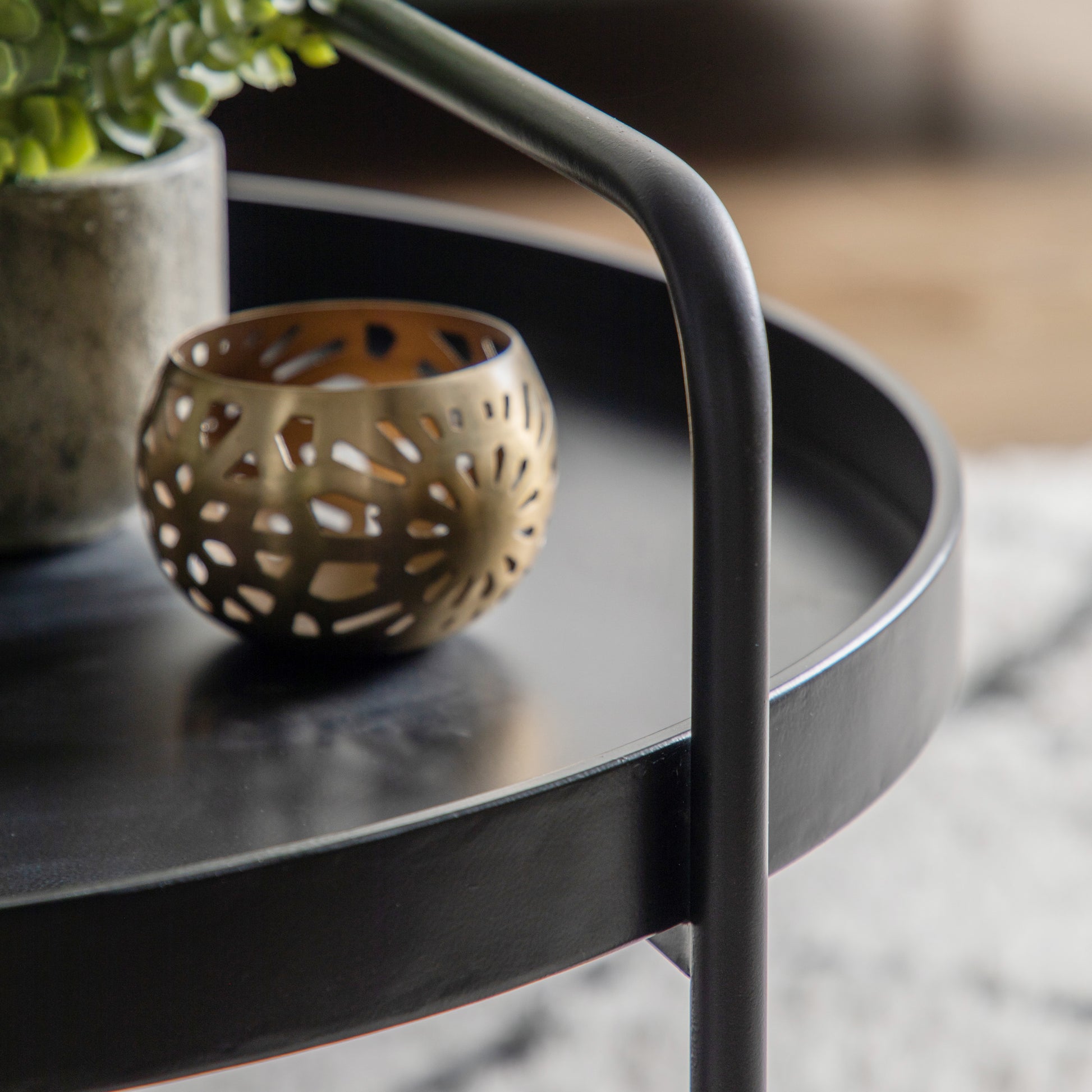 Gallery Direct Sennen Coffee Table in Black metal with a tray-style table top, handle detail and lower shelf