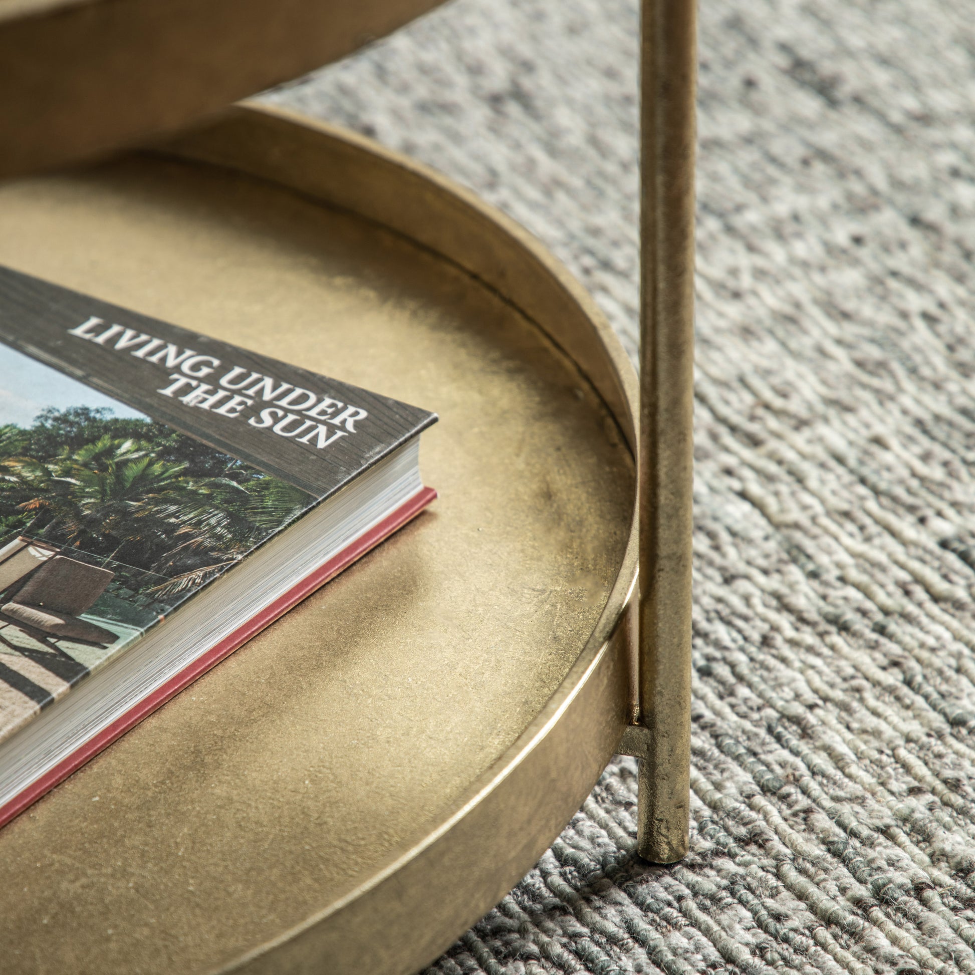 Gallery Direct Sennen Coffee Table has Gold leaf finish metal frame with tray style table top and lower shelf