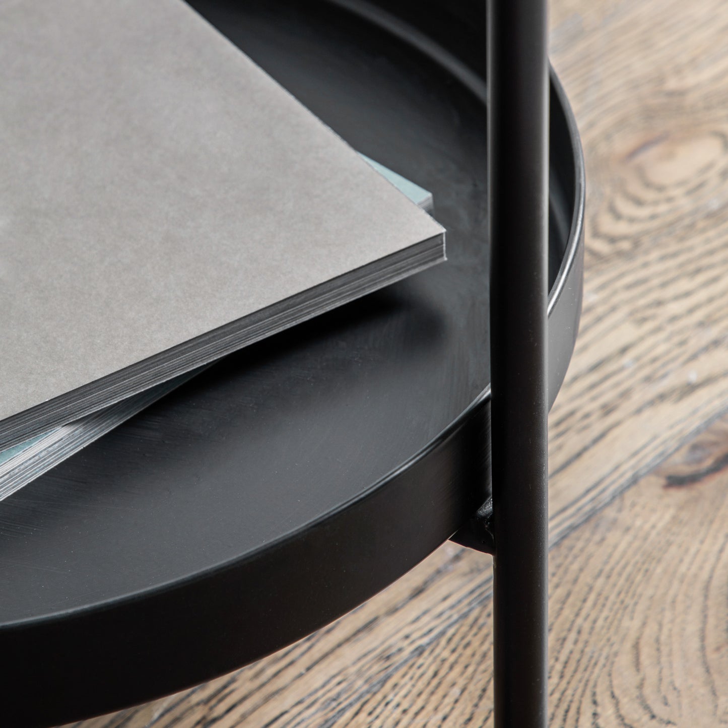 Gallery Direct Sennen Side Table in Black metal with a tray table top and a lower shelf