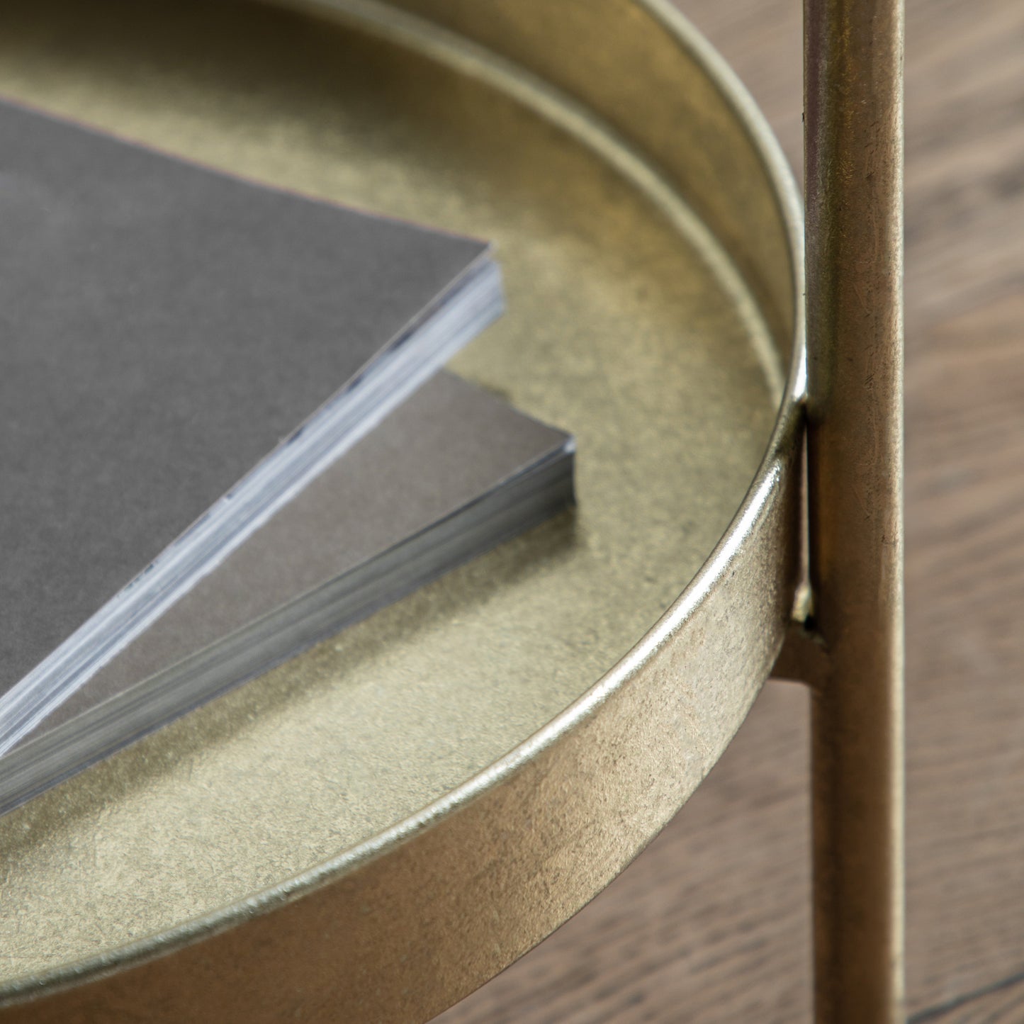 Gallery Direct Sennen Side Table in Gold leaf finish with a tray table top and lower shelf