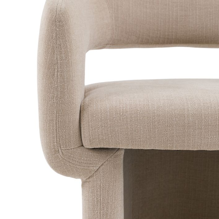 Gallery Direct Sloane Dining Chair upholstered in Natural fabric with padded seat and curved backrest