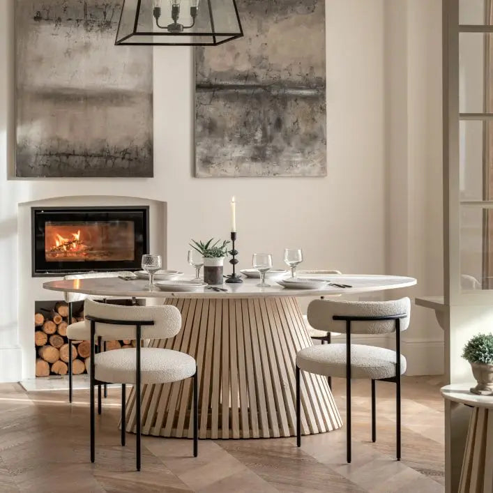 Gallery Direct Soho Oval Dining Table is a modern and contemporary designed table made of marble and mango wood, can seat up to 6 people