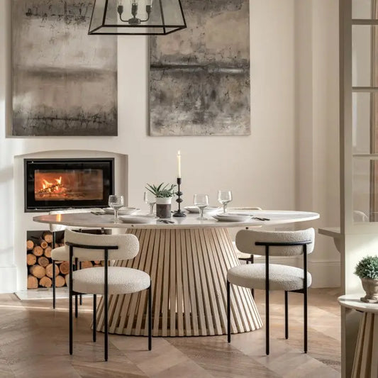 Gallery Direct Soho Oval Dining Table is a modern and contemporary designed table made of marble and mango wood, can seat up to 6 people