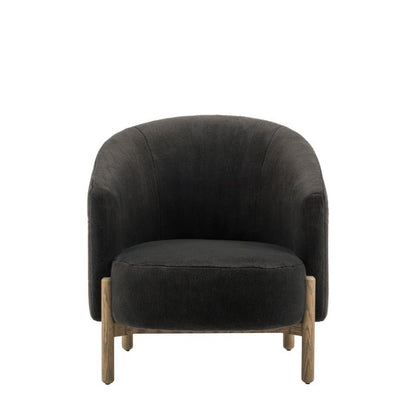 The Gallery Direct Tindon Armchair in Alaska Graphite soft plush upholstery with light wooden base and legs