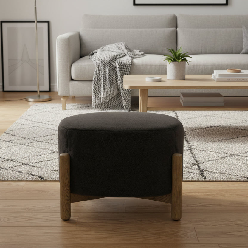 Gallery Direct Tindon Footstool upholstered in Alaska Graphite grey soft plush fabric with natural coloured wooden legs