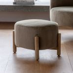 The Gallery Direct Tindon Footstool has a sturdy wooden base and a soft plush upholstered cushion in Alaska Khaki colour