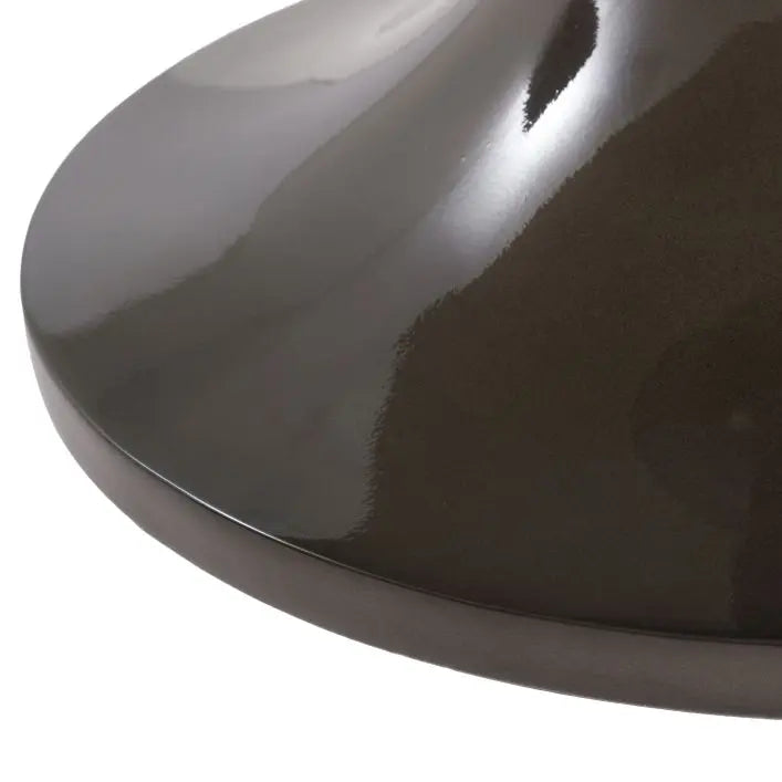 Gallery Direct Tivoli Dining Table features a fluted table base crafted from glass reinforced concrete in a rich charcoal brown glaze with glass table top
