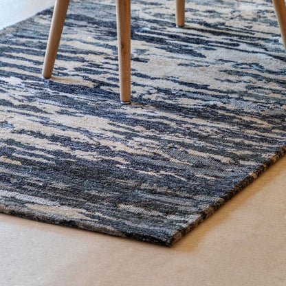 Gallery Direct Trisul Rug measures 1200x1800mm and features an abstract pattern in blue, ink and beige colours to provide a striking focal point of any room