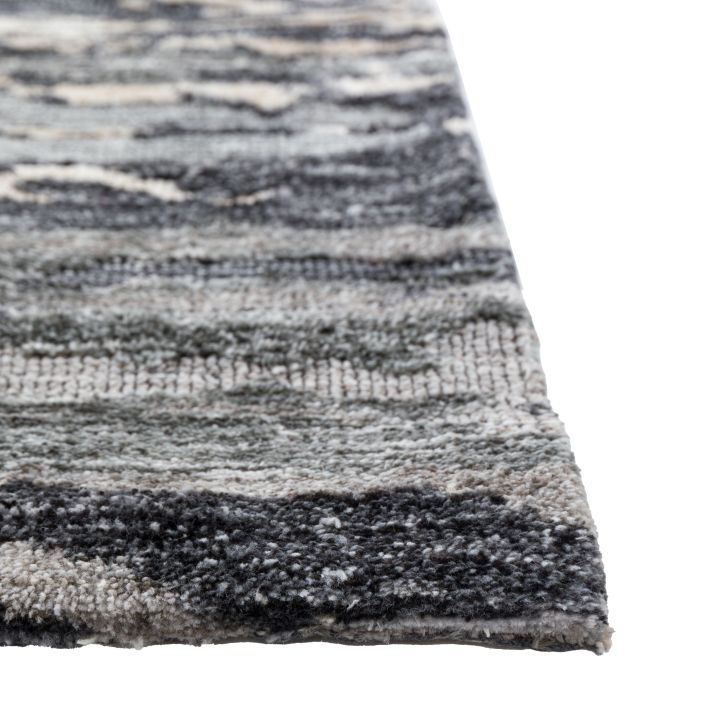 Gallery Direct Trisul Large Rug measuring 1600x2300mm makes an ideal focal point in any room, made with circular knotted polyester materials and in complementary colours of blues, greys and beige 