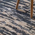 Gallery Direct Trisul Rug 1600x2300mm features a striking abstract pattern of grey, blue and beige colours