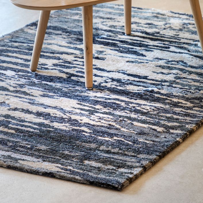 Gallery Direct Trisul large rug measures  1600x2300mm and features an abstract pattern of blue, grey & beige colours