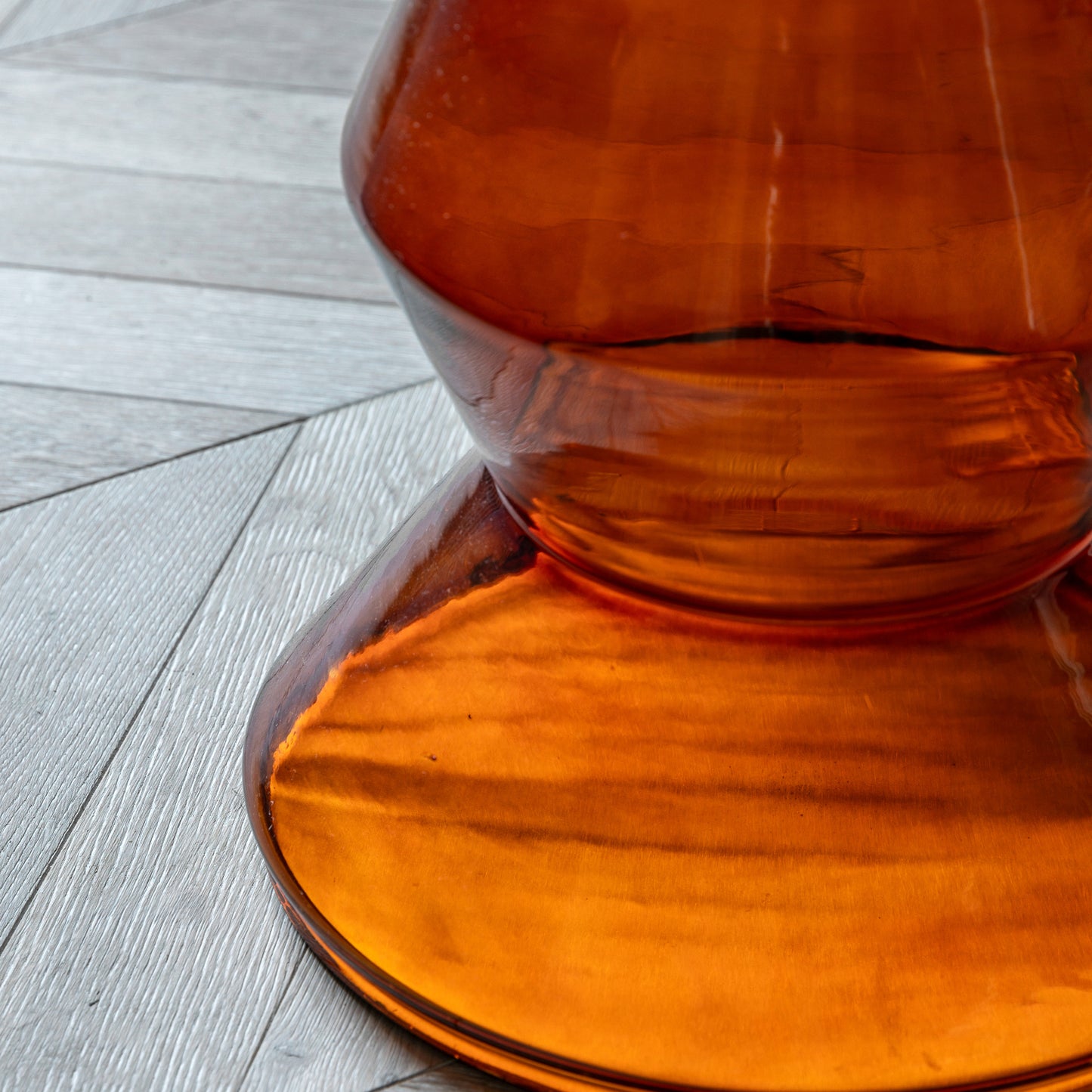 Gallery Direct Turin Side Table features an Orange glass base